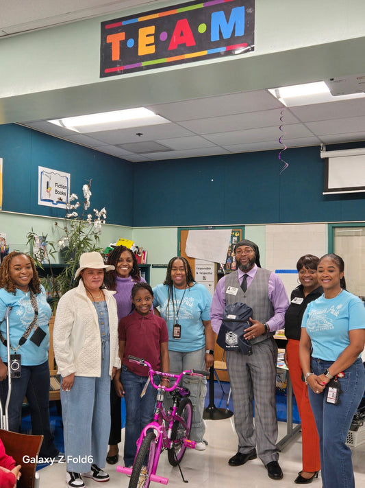 Holiday Joy: Pioneer Park Elementary Students Receive Bicycles